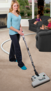 MD Central Vacuum - Woman Vacuuming